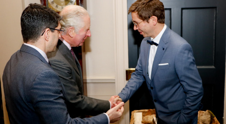 Stéphane Hallaire shaking hands with HRH the Prince of Wales in the presence of Marc Palahi from EFI